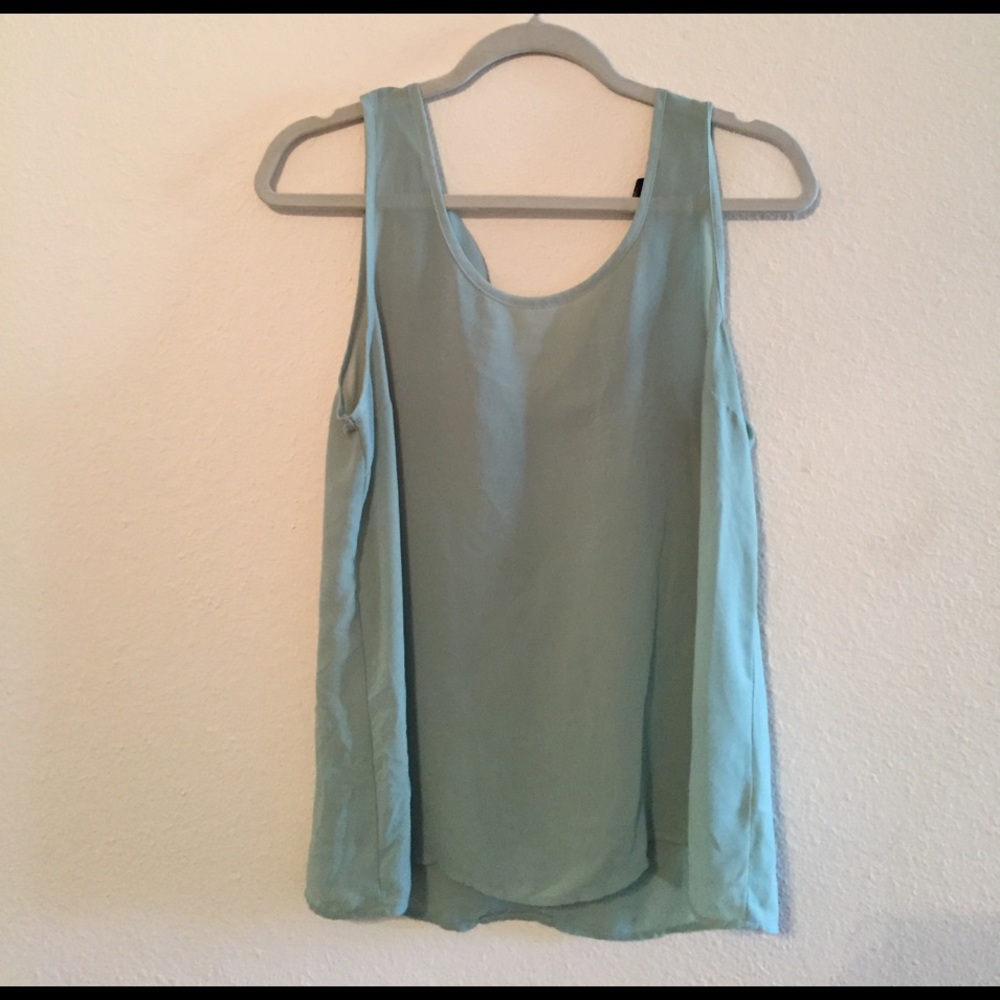 Sheer green blouse with tied back