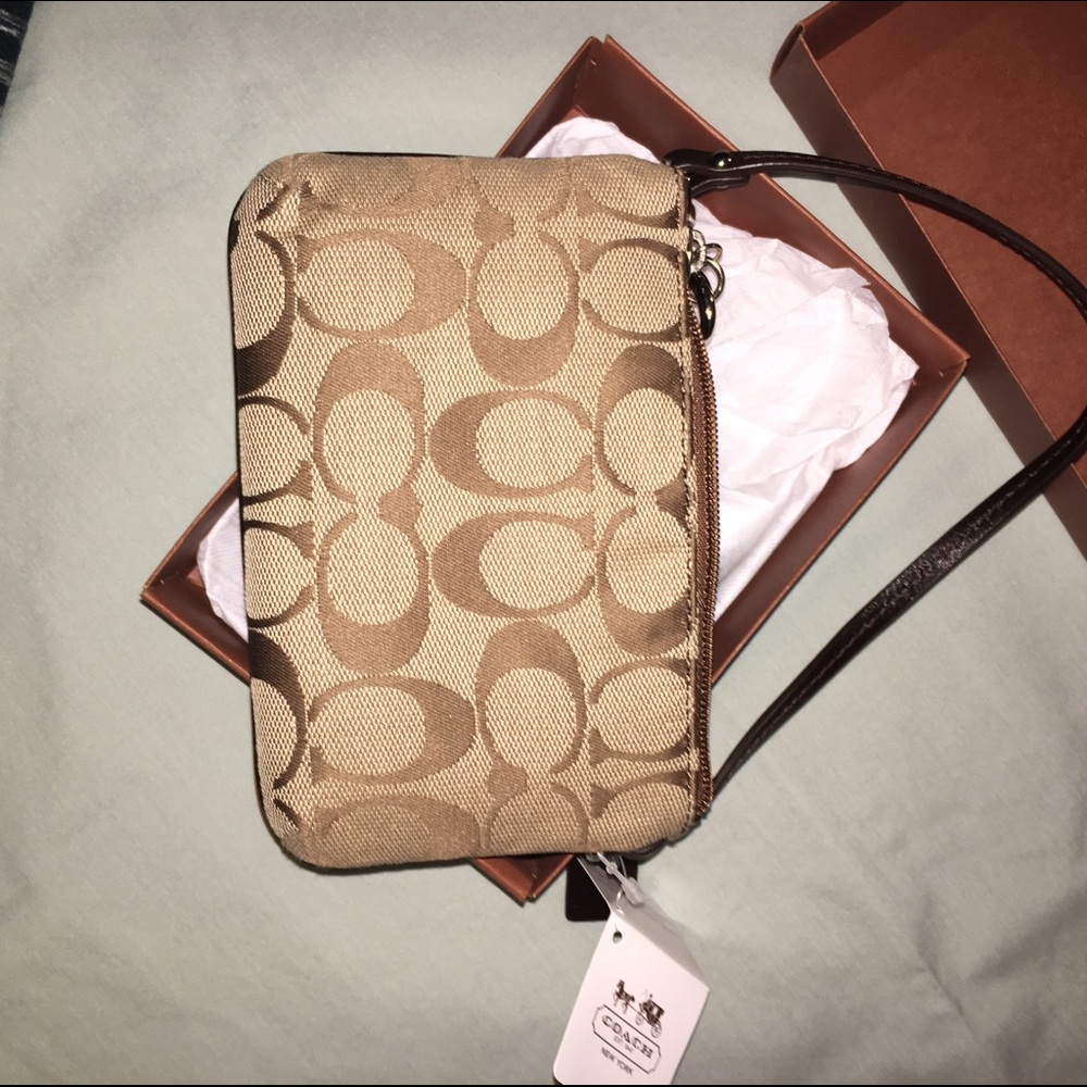 PRICE DROP!! Coach wristlet NEW WITH TAGS AND BOX!