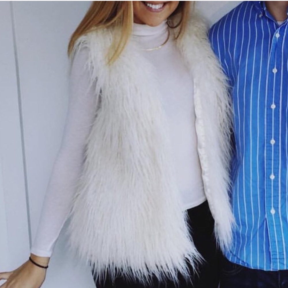 White faux fur vest