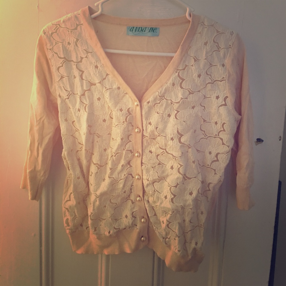 Sweater with lace and "pearl" buttons.