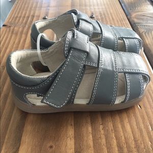 See Kai Run Gray Sandals.