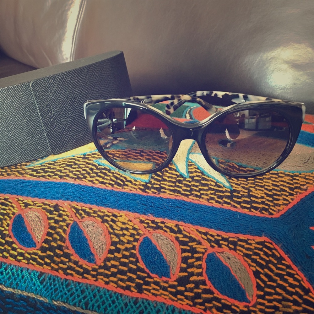 Authentic Prada sunglasses. Never worn.