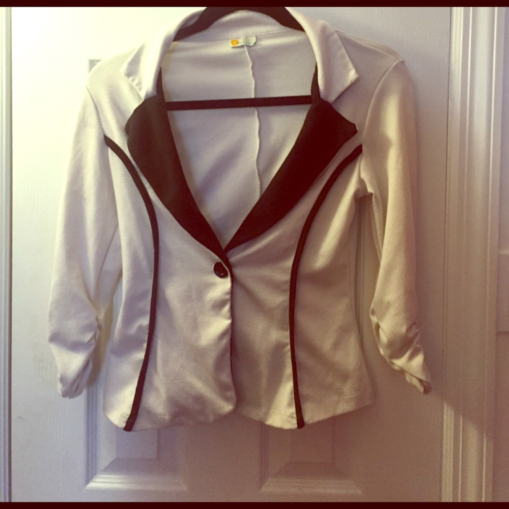 White and black blazer