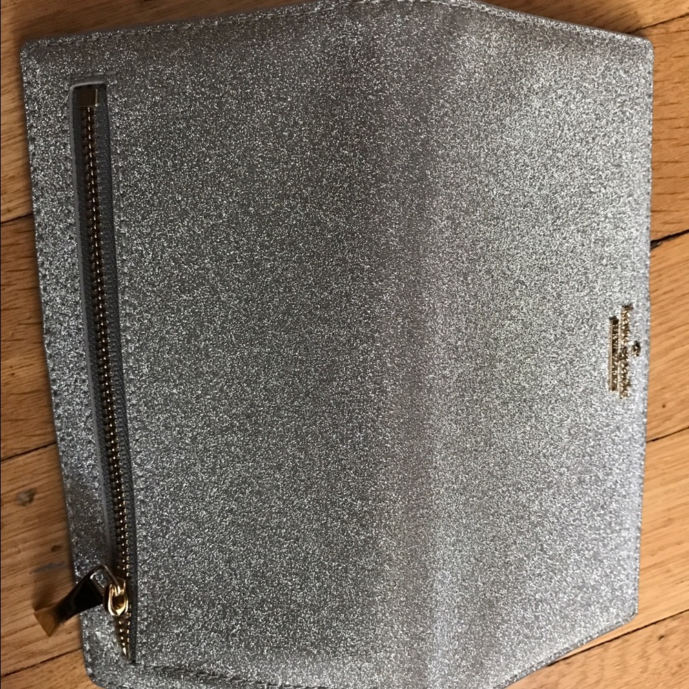 Authentic new Kate Spade wallet silver glitter