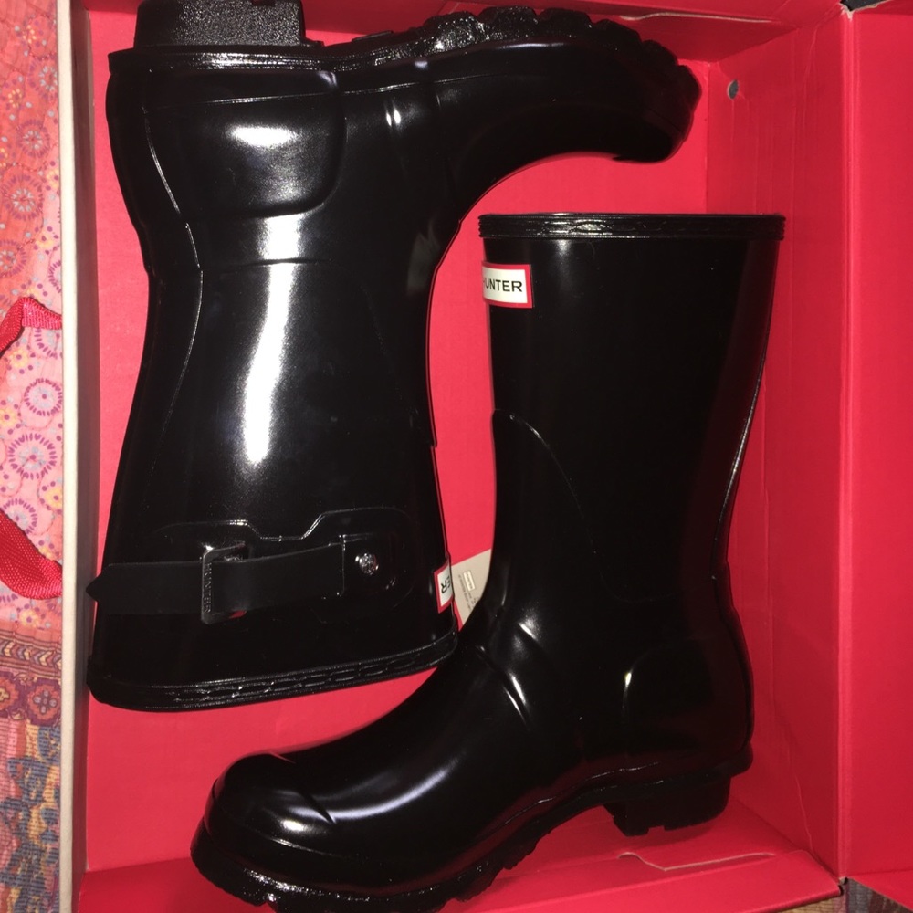 Brand new black, mid-calf, size 7 Hunter Boots.