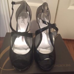 Black heeled cross front Carlos Santana Heels
