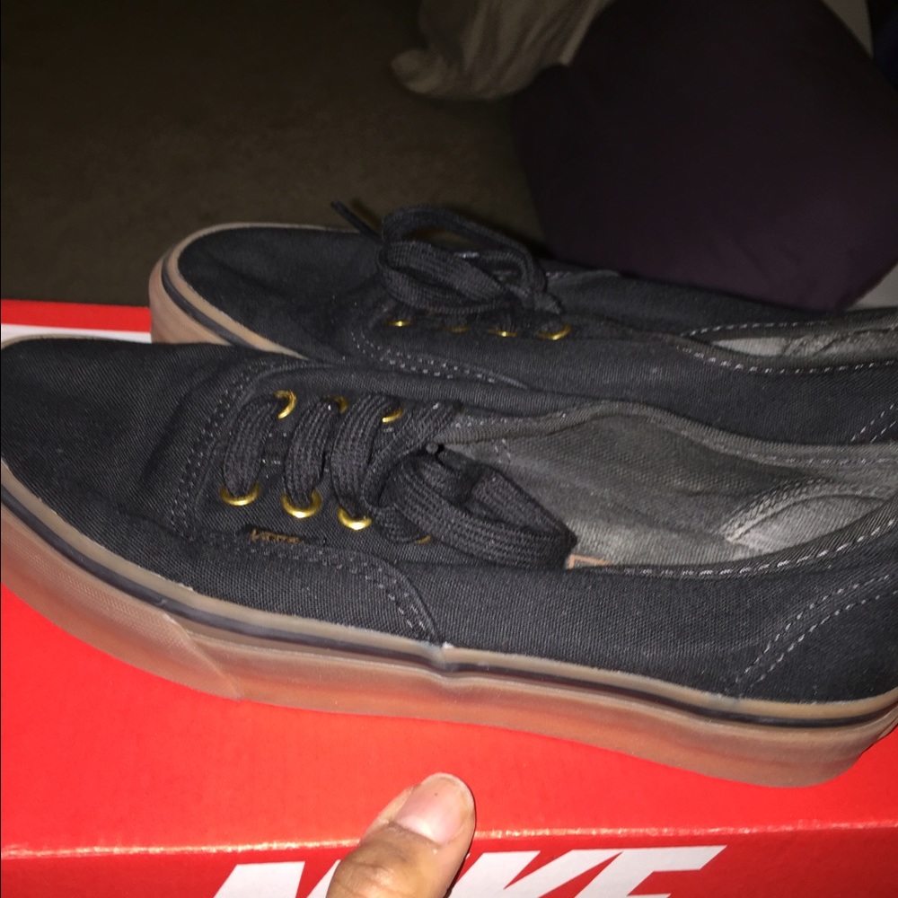 Black and brown Vans