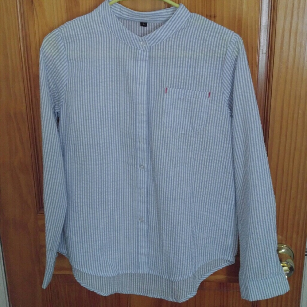 Shirt. light blue. new..size s. blouse