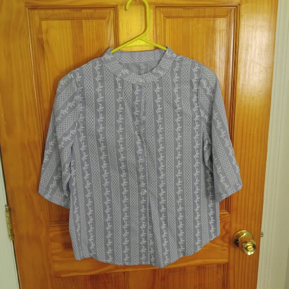 Light blue shirt. blouse.stitchwork. new .size s