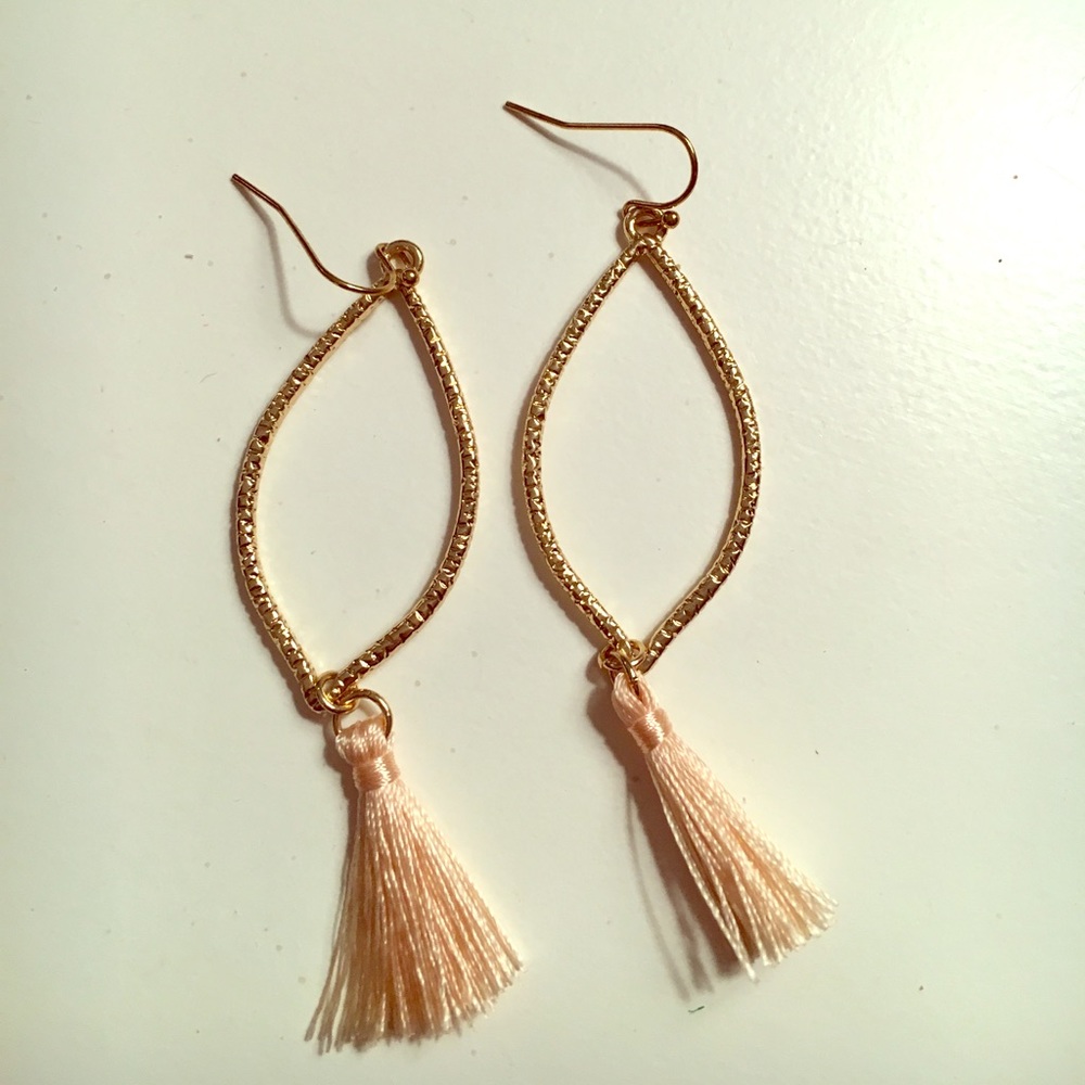 Gold earring with pink tassel