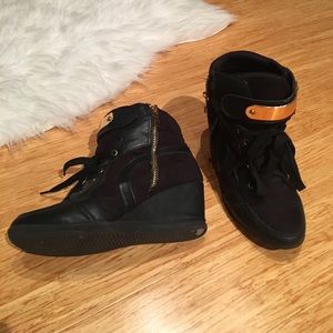 Black and gold trainer wedges