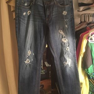 Patched and ripped Express jeans