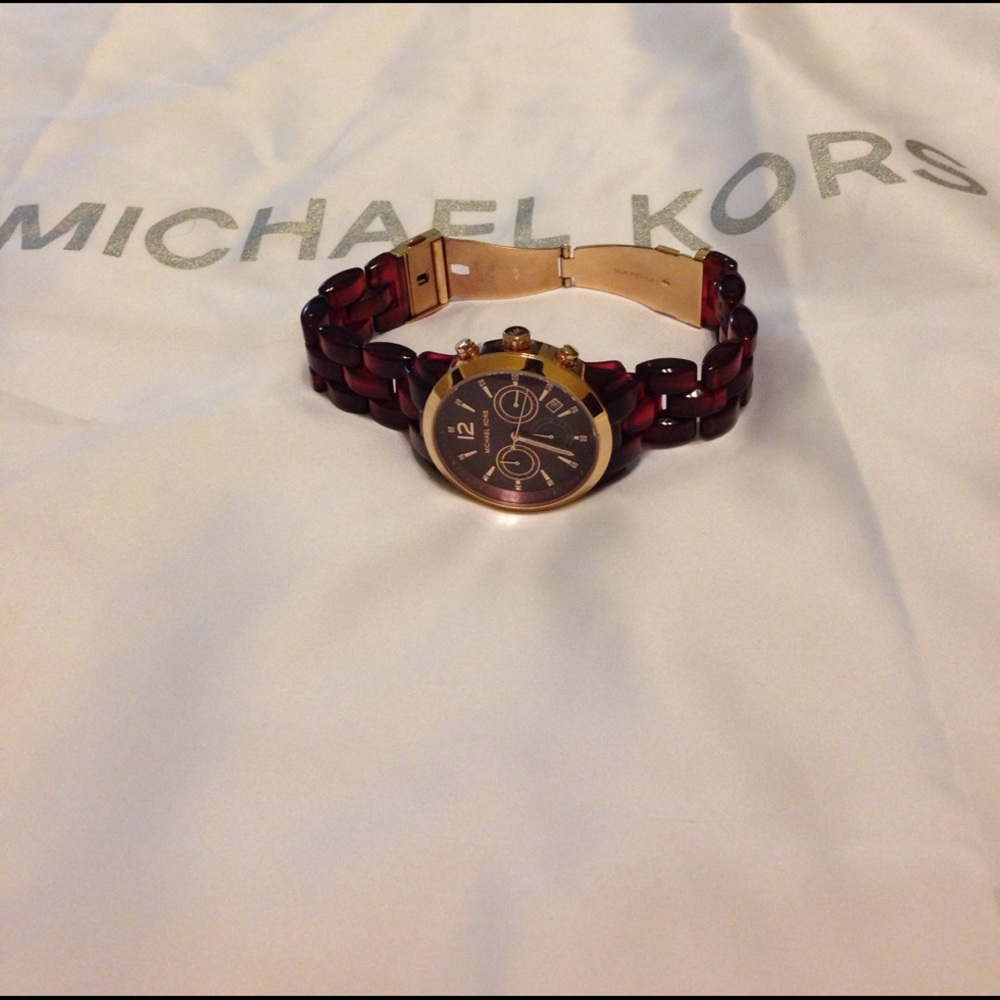 💯% authentic Michael Kors red and gold watch