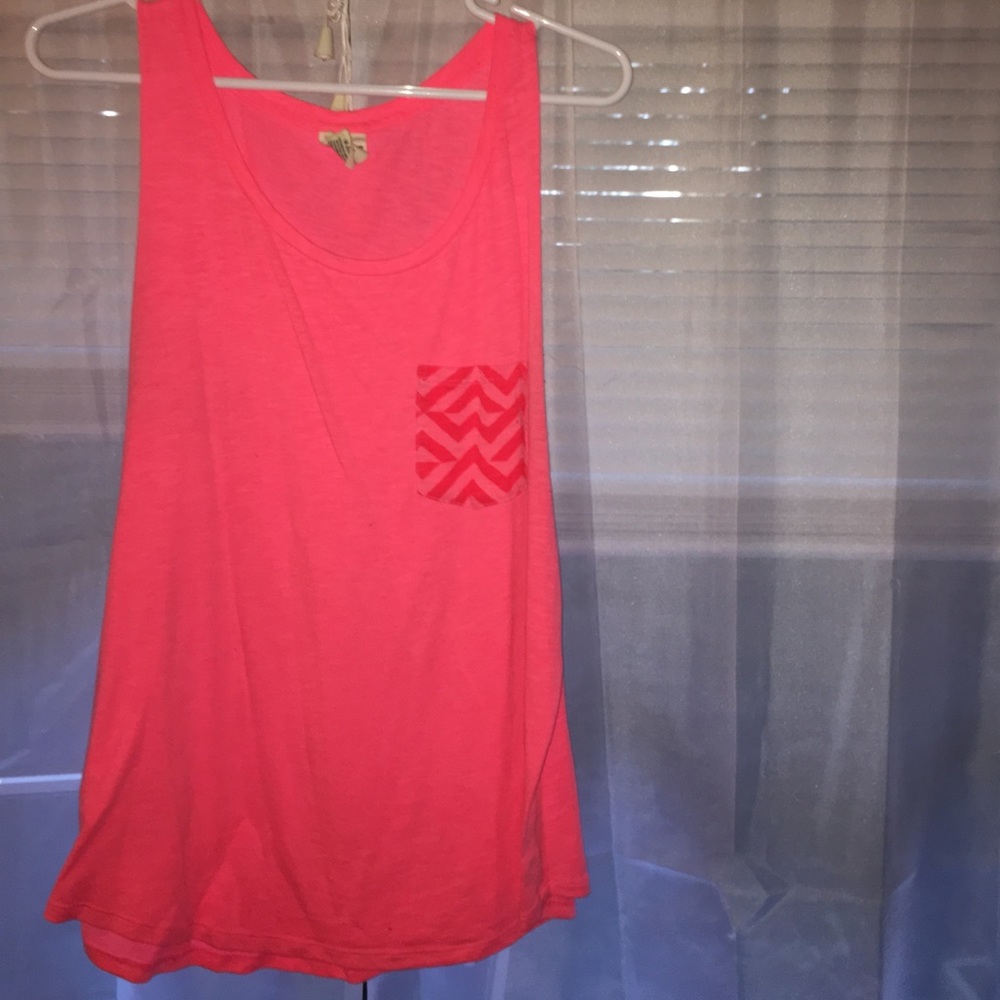 Pink muscle tee with chevron detail pocket