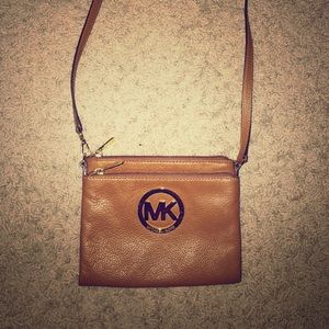Michael Cors tan and gold cross body
