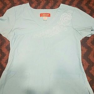 Blue scrub top with flowers