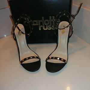 Gold studded black heels