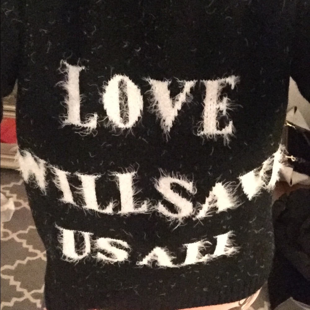 Black sweater with quote