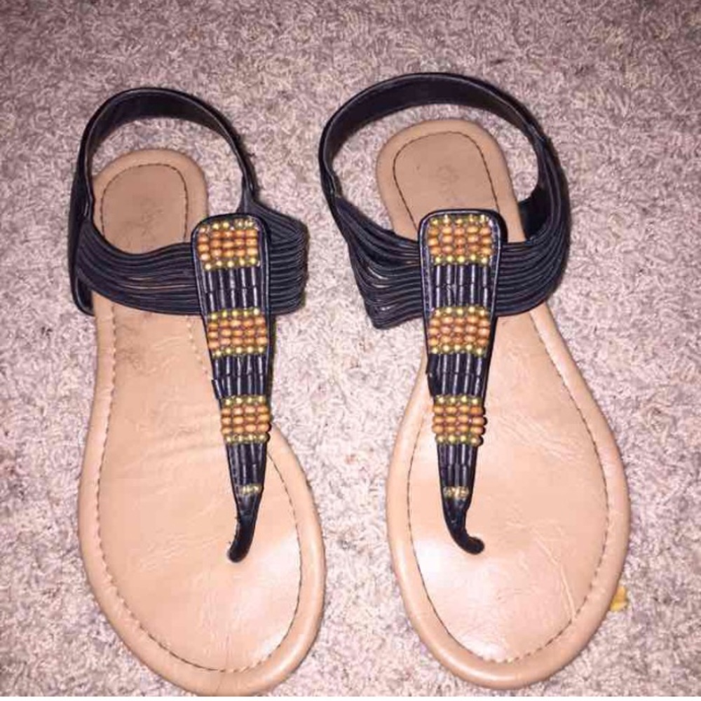 Brown and black sandals