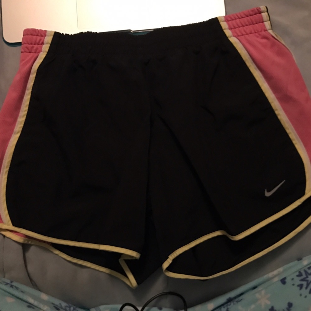 Black Nike shorts with pink and yellow