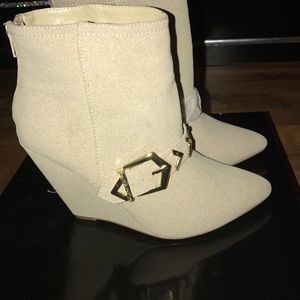 Beige wedge booties