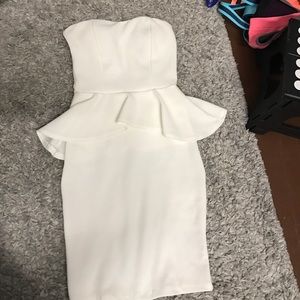 Sweetheart neckline white peplum dress