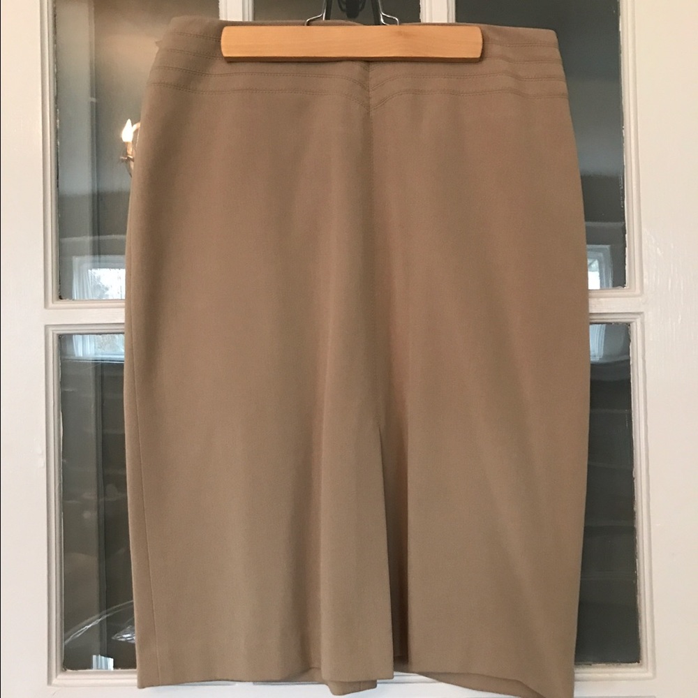 Stretchy tan skirt with fun front slit