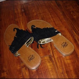 Moccasin style flip flops