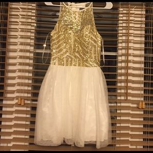 A white and gold homecoming dress