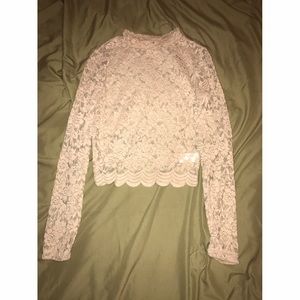 Tan all lace long sleeve mock neck crop top.