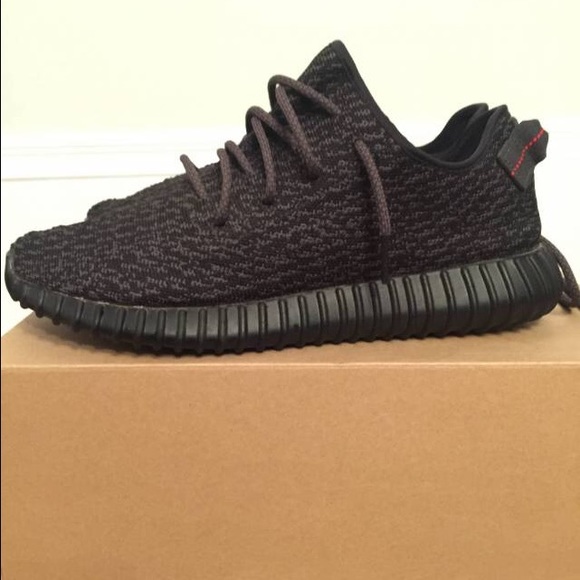 Yeezy Pirate Black Size 11 never been used!