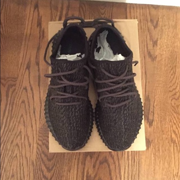 Yeezy Pirate Black Size 11 never been used!