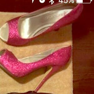 Peeptoe pink glitter pumps