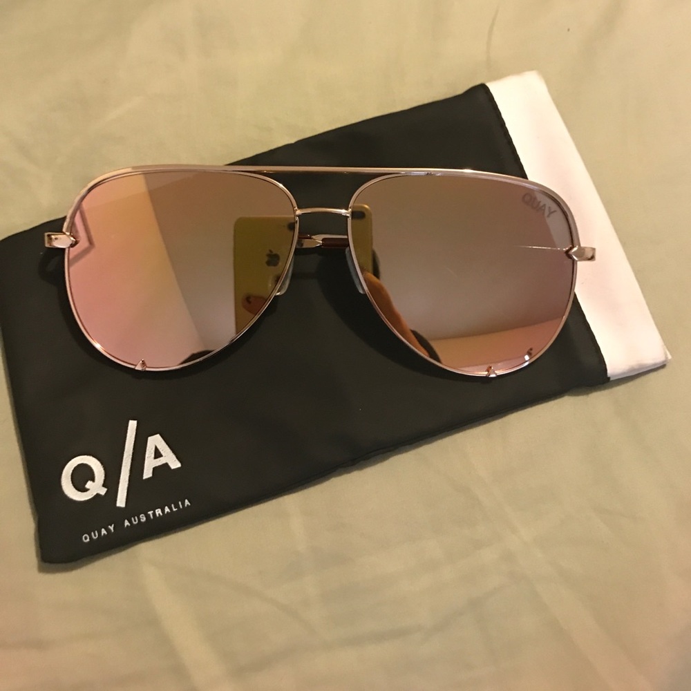 Rose gold aviators with studs on lenses
