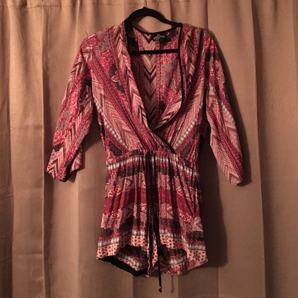 Woman's romper multi colored earth tones,