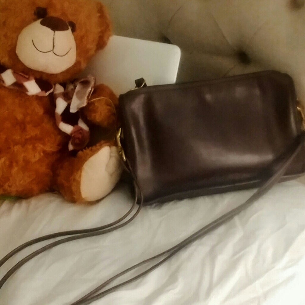 Leather shoulder little coach.
