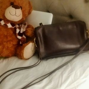 Leather shoulder little coach.