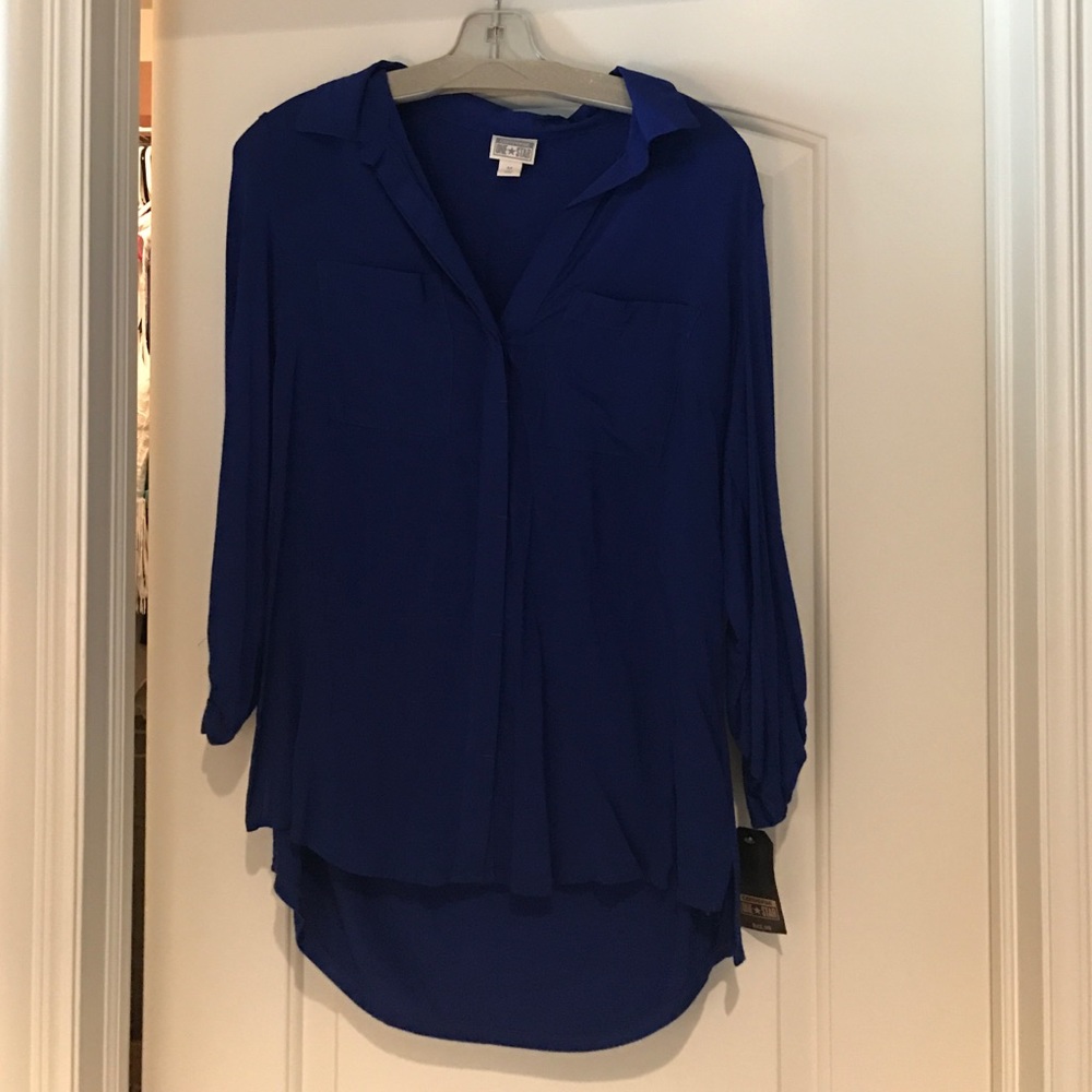 Never worn long sleeve collared shirt