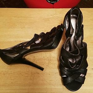 Black leather Coach platform sandals