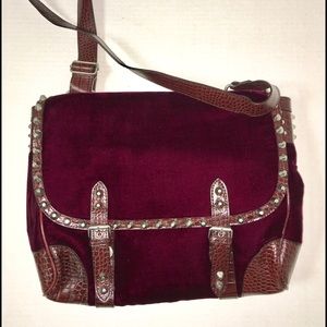 Great looking velvet messenger bag.  Brand new