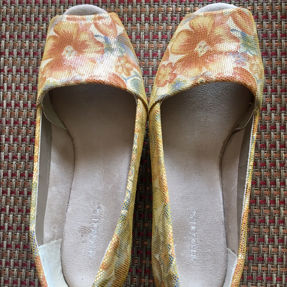 Peep toe wedges.