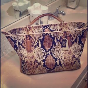 Coach Purse snake print with Leather trim.