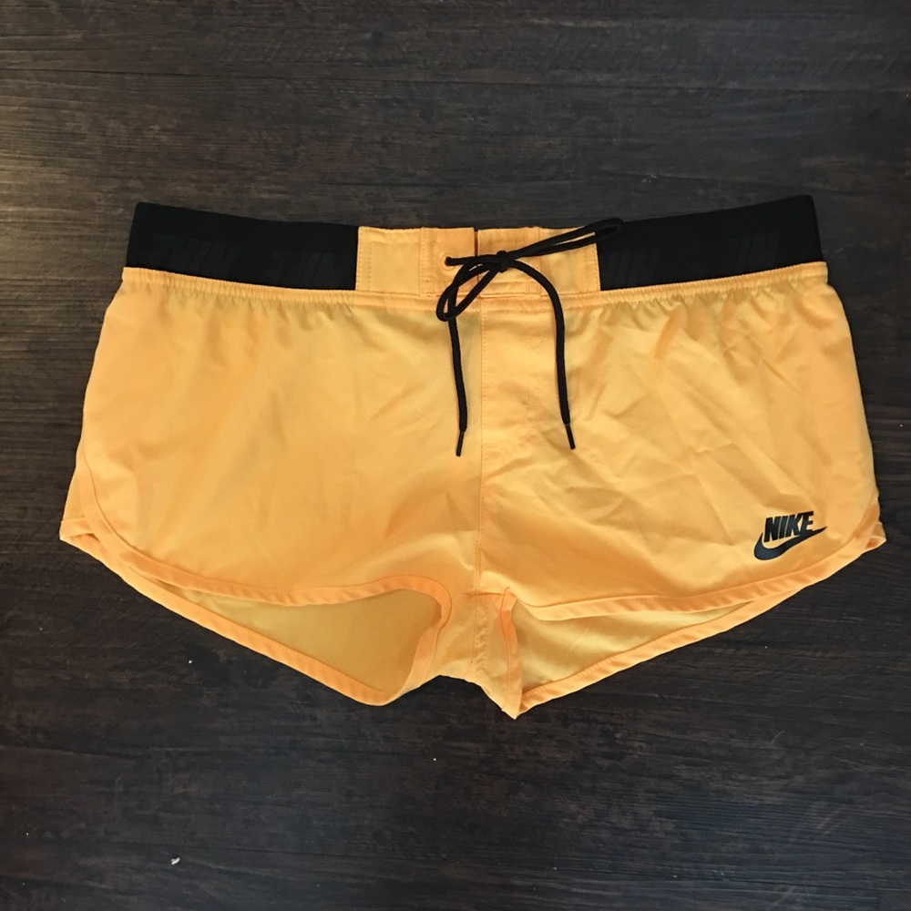 yellow Nike pool shorts