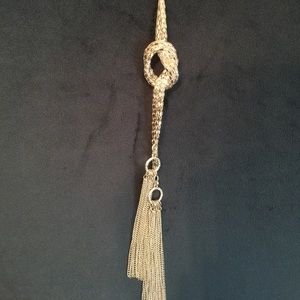 Long costume necklace with knot and tassels