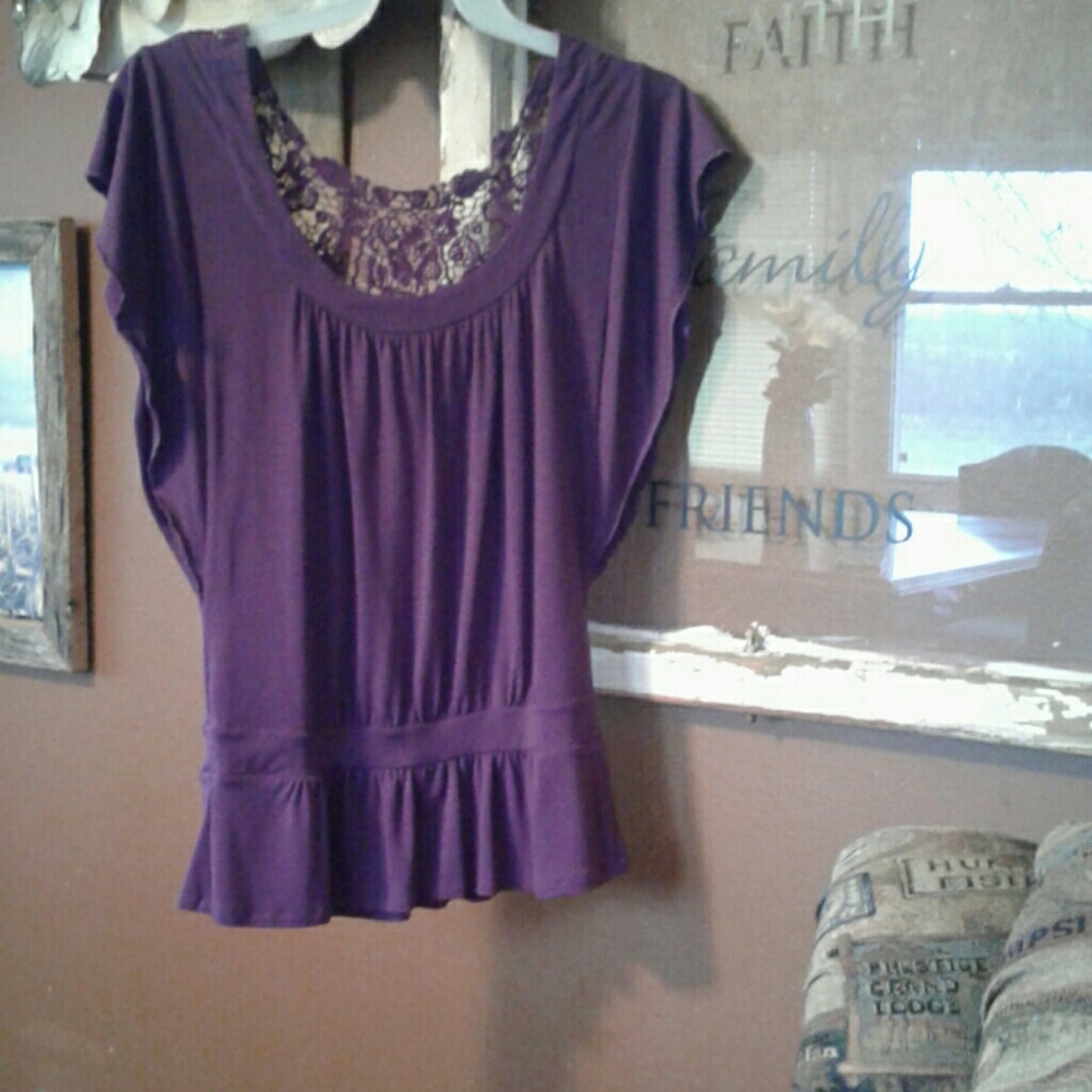Purple peplum style top with lace detail