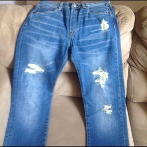 Brand new Levi's 501 jean with distress