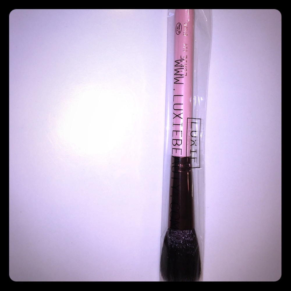 Brand new blush brush! In package.