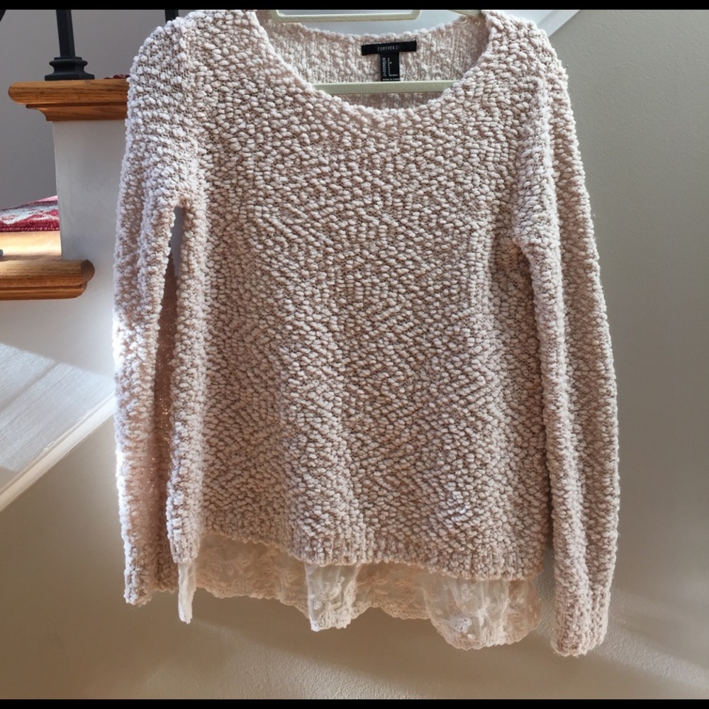 Light pink sweater.