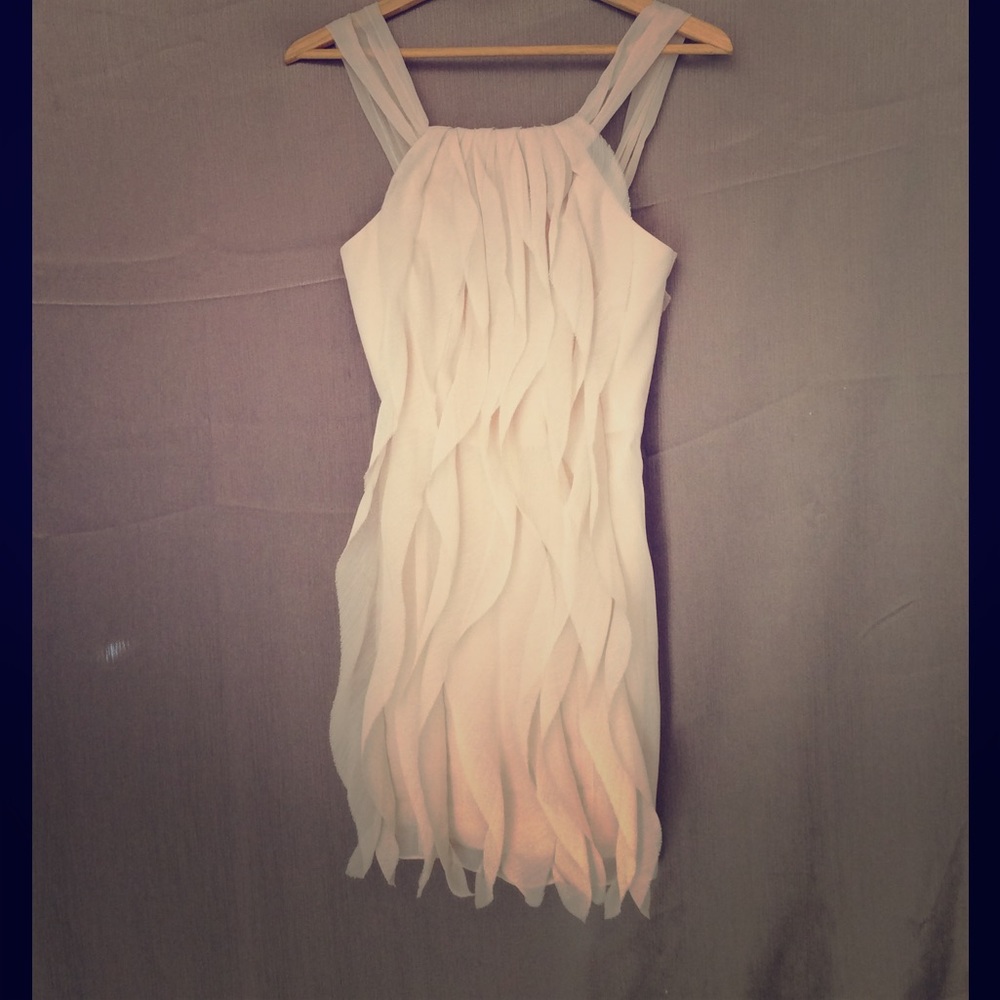 Short, cream colored, fitted dress