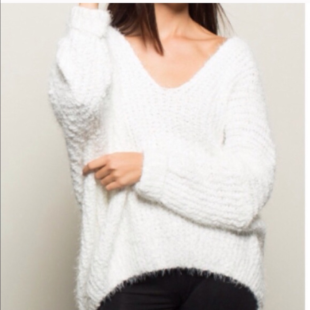 White fuzzy sweater